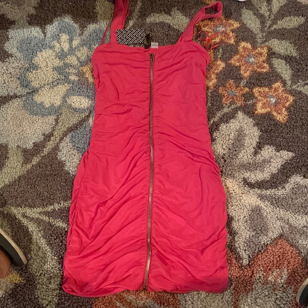 Barbie pink dress with front zipper and ruching. Lots of stretch.